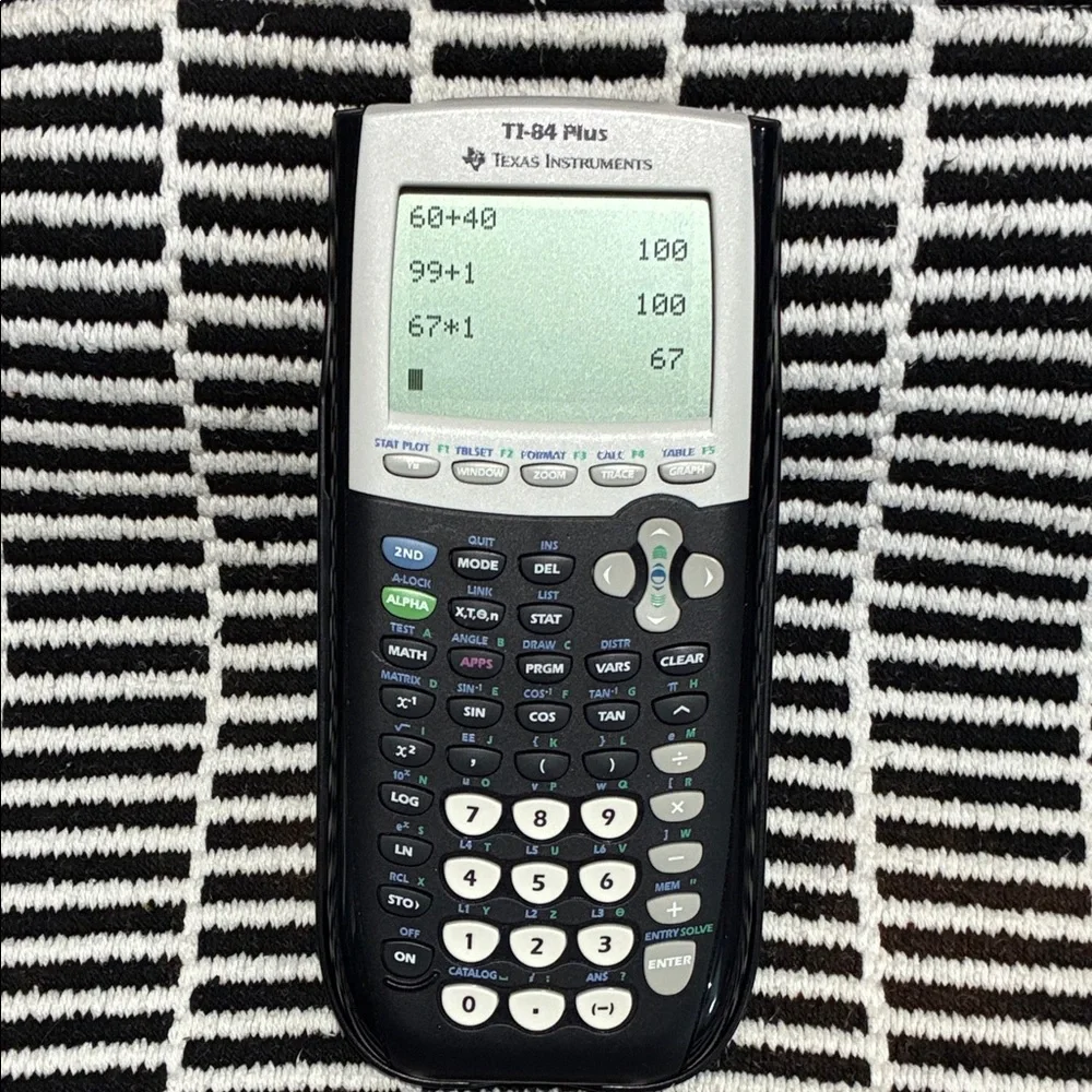 Texas Instruments TI-84 Plus Graphing Calculator - Black and Gray